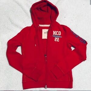 Hollister, red hooded jacket size M missing drawstring